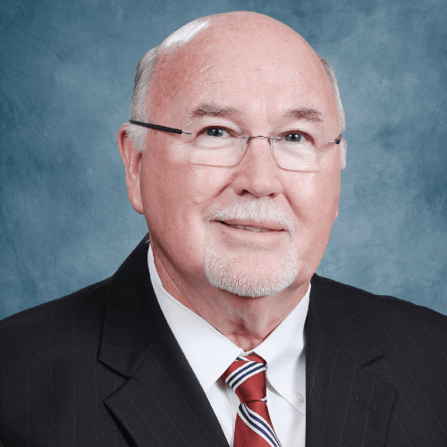 Roger Kennedy, Jr., founder of Kennedy Broadband on blue background